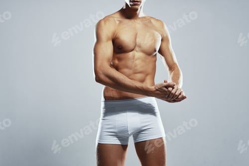 Preview: sporty man inflated stroller white briefs home workout gym