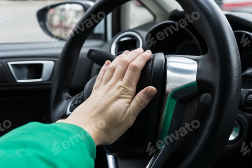 Preview: Nervous man driver pushing car horn