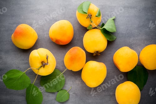 Preview: Apricot with leaves on wooden background.