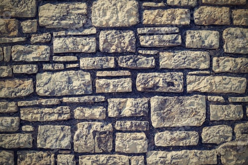 Preview: The Abstract Textured Background Of A Stone Wall Closeup And A Blank Space For The Text
