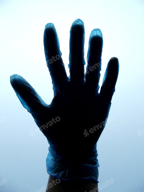 Preview: Blue gloved hand on a white backdrop