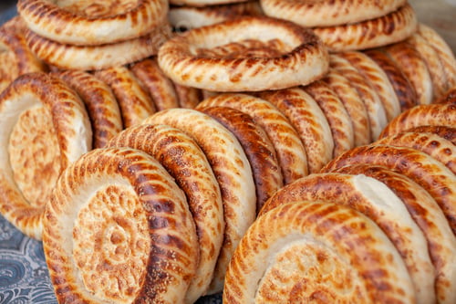 Preview: Typical traditional flatbread with crunchy crust with sesam just baked