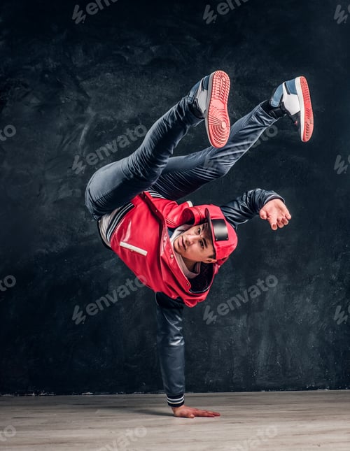 Preview: Hip-hop style dancer performs breakdance acrobatic elements.