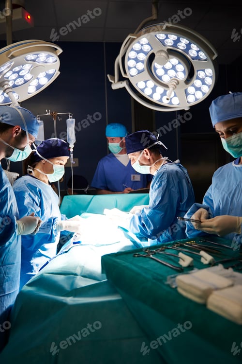 Preview: Dark operating room and surgeons