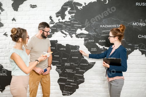 Preview: Couple with travel agent at the office
