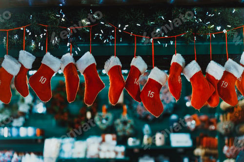Preview: Advent calendar in form of hanging red stockings. Christmas decoration. Traditional festive decor.