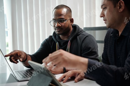 Preview: Developers Discussing Mobile App Features