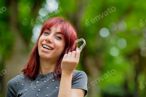 Preview: Beautiful Smiling Turkish Woman with invisible teeth bracket aligner