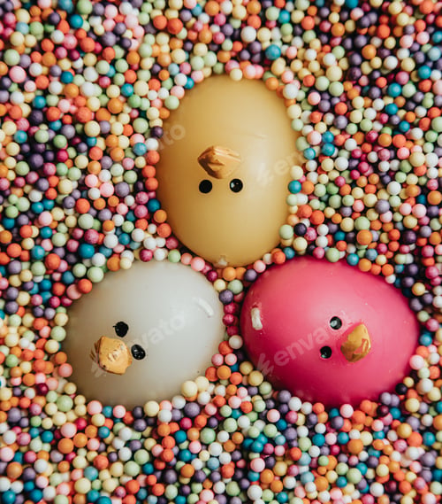 Preview: Funny image of a toy surrounded in colorful balls, smiling duck toy, party concept with copy