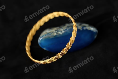 Preview: Gold bracelet on blue agate stone