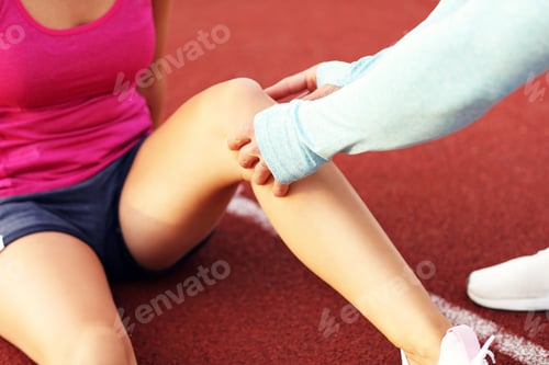 Preview: Man and woman racing on outdoor track