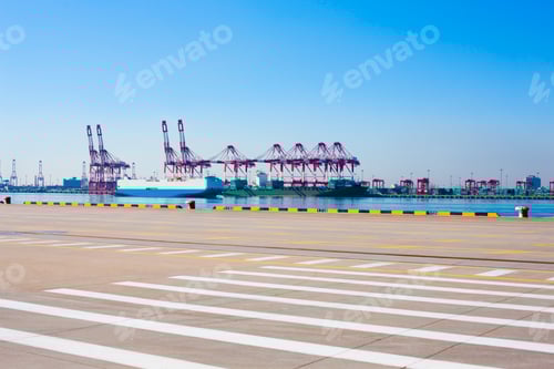 Preview: Cranes and cargo ships on the shipping dock