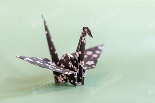 Preview: Origami crane on a pale mint background