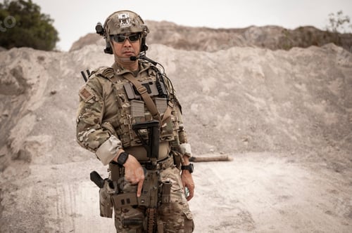 Preview: Soldiers aiming with their rifles
ready to fire during military operation