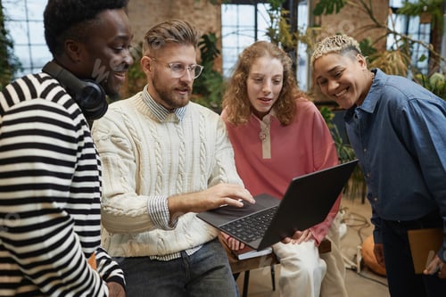 Preview: Business Team Looking at Laptop Screen