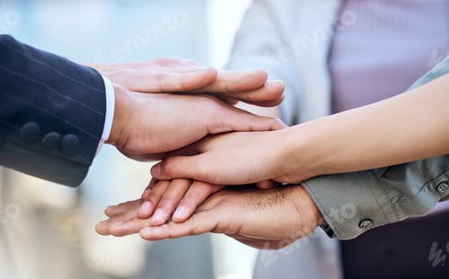 Preview: We can do this. Shot of a group of unrecognizable businesspeople stacking their hands.