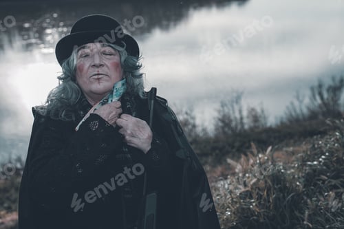 Preview: dark evil character holding euro cash outdoors a cloudy dark day - evil war grief concept