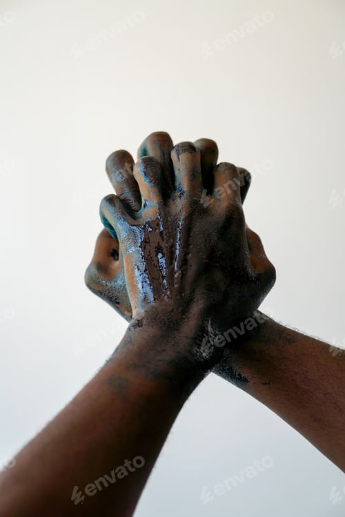 Preview: Dark skin hands painted with blue paint