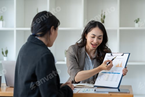 Preview: Business idea creative brainstorming sessions for projects Strategic topic of two Asian girls workin