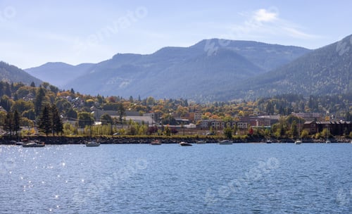 Preview: Scenic View of Kootenay River and a small touristic town
