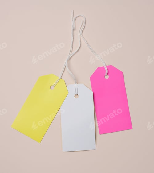 Preview: Set of empty white cardboard tag on a white rope, beige background. Price tag template