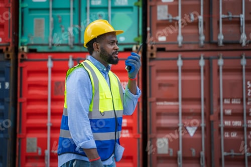 Preview: Foreman checking loading Containers box for Cargo freight ship for import export.
