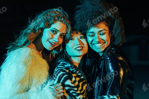 Preview: Close up of three happy girls looking at camera