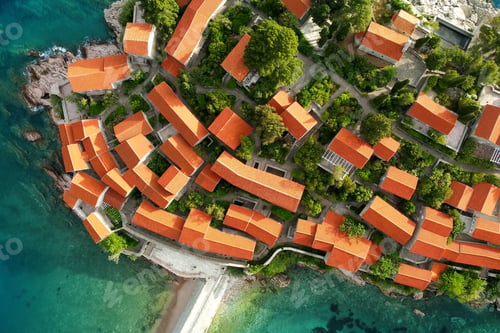 Preview: Amazing sunset aerial top drone view of Sveti Stefan island with historical town.