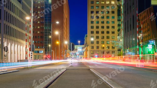 Preview: The city at night. Buildings and skyscrapers. The business centre. The lights from cars