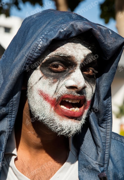 Preview: Close-up portrait of a horrible scary zombie man. Horror. Halloween.