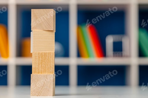 Preview: Blank wooden cubes with copy space for your design on office working table