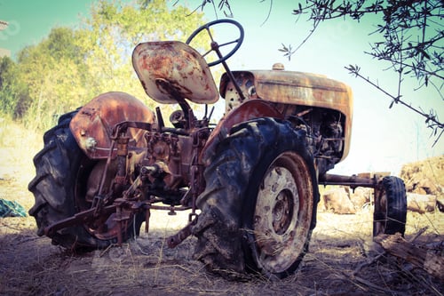 Preview: Old rusty vintage farm tractor