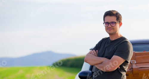 Preview: Young man with travel suitcase