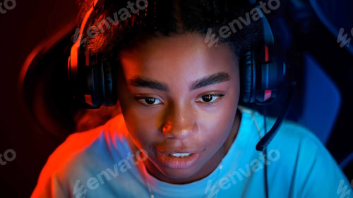 Preview: Teen playing in video game club