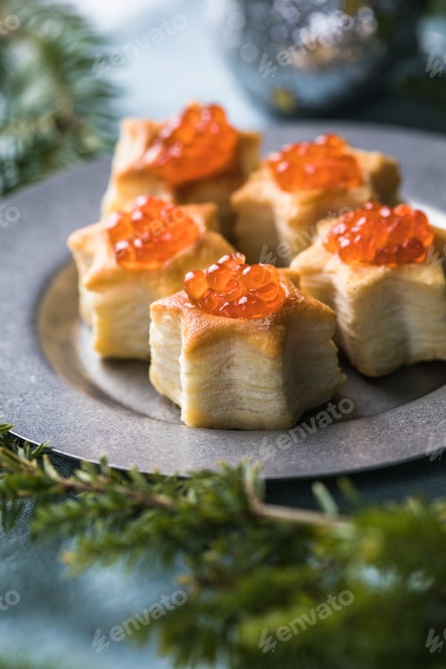 Preview: Christmas tree canape or sandwich with cucumber slice, salmon for festive x-mas snack. New year