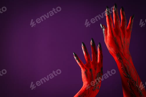 Preview: Creepy, red hands of a monster with black nails