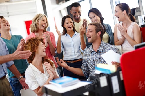 Preview: I passed. Shot of a diverse group of coworkers celebrating good news at the office.
