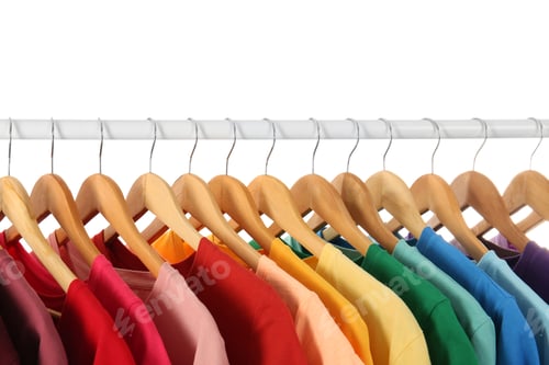 Preview: Colorful Clothing on Hangers in Rainbow Arrangement