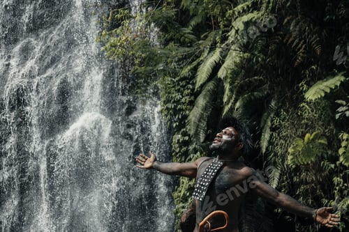 Preview: Black man from Papua Indonesia tribe enjoying the nature