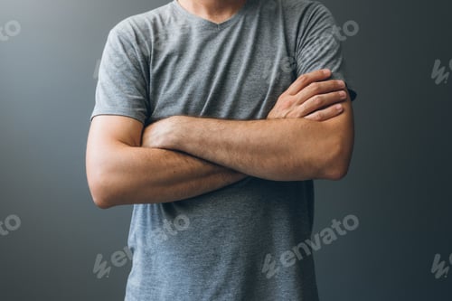 Preview: Casual adult man with arms crossed, body language