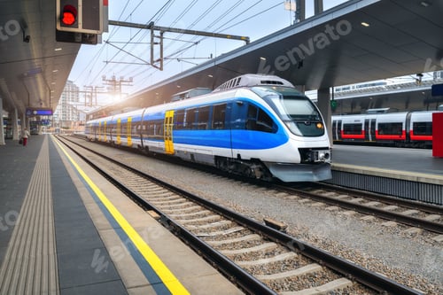 Preview: High speed train on the train station at sunset in Vienna