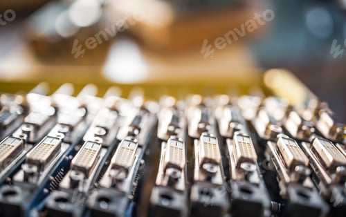 Preview: Close-up blurry metal sockets on a computer video board