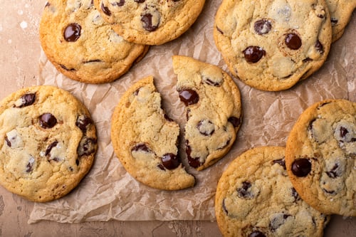 Preview: Freshly Baked Chocolate Chip Cookies on Brown Paper
