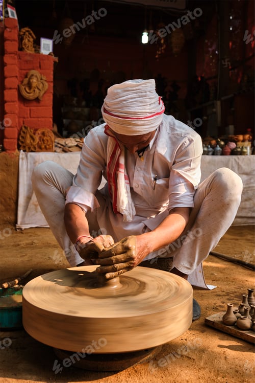 Preview: Indian potter at work, Shilpagram, Udaipur, Rajasthan, India