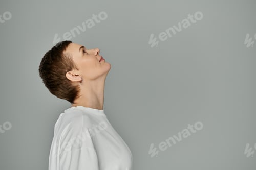 Preview: Woman gazes upward