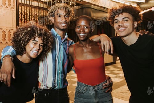 Preview: Friends hanging out outside a cinema