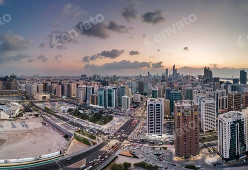 Preview: Abu Dhabi sunset, view from the drone. High resolution panorama of the modern cityscape.