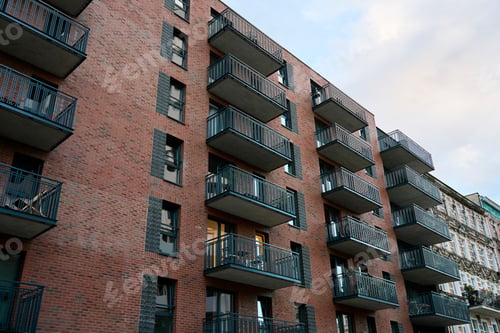 Preview: Facade of residential building with balconies