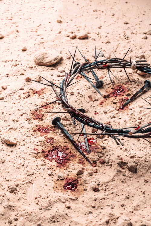 Preview: Crown of thorns and bloody nails on ground. Good Friday, Passion of Jesus Christ. Christian Easter