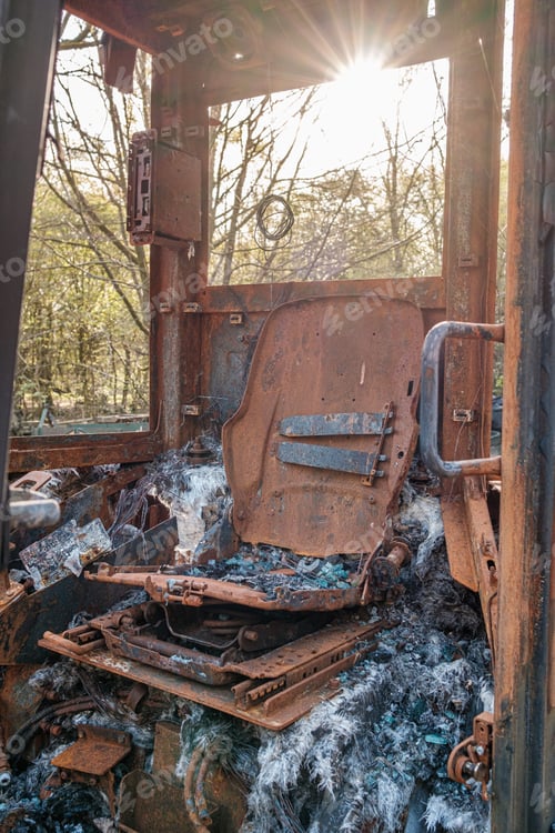 Preview: Burnt out construction digger by thieves.